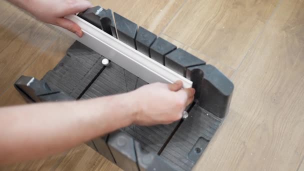 Workman Measuring Fixing White Plastic Plinth Cutting Further Installing Handyman — Stock Video