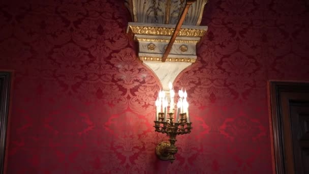 Vintage Candlestick Electric Lamps Red Wall Hall Antique Gilded Chandelier — Stock Video