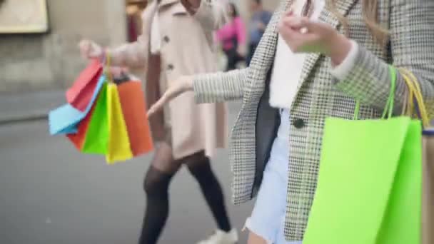 Gorgeous Female Friends Walking Centre Street Colourful Shopping Bags Hands — Video