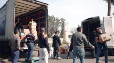 ROME, ITALY - MARCH 10, 2022: Association of St. Sophia Church in Rome organised humanitarian aid gather for Ukrainian people suffered from the war, basic necessities like long storage food, clothes