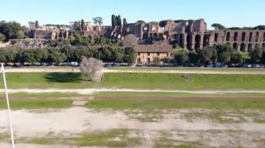Famous architectural landmark in the centre of ancient Rome city, ruins of ancient powerful Roman Empire called Forum Imperial, aerial view of tourist sightseeing. High quality 4k footage