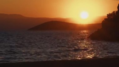 Zaman aşımı, Yunanistan 'ın Mora Adaları' nda Güzel Gün Batımı