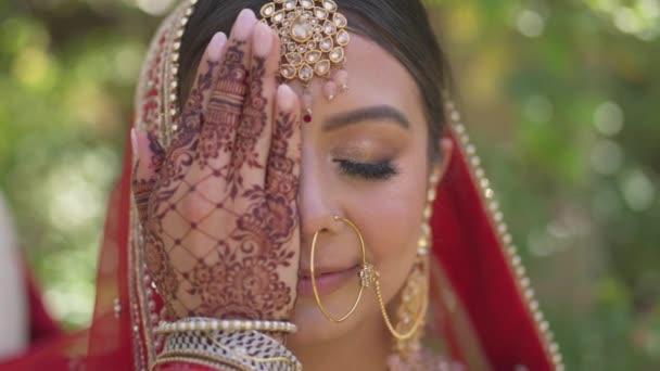 Portrait Happy Indian Bride Covering Her Face Her Hand Hindi — Stockvideo