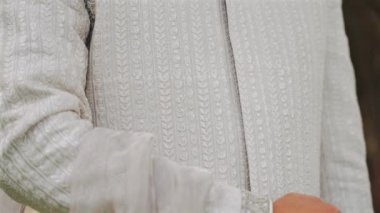 Inside the Indian wedding, the bridegroom brides together and worships the Lord. Happy indian groom wearing white traditional clothes, beautiful portrait