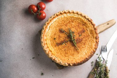 Classic chess pie pairs a traditional butter pie crust with a sweet, custardy filling in white baking dish, american cuisine