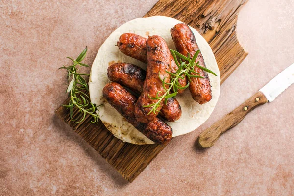 stock image Grilled meat sausages. Fried sausage. Grilling food, bbq, barbecue. place for text, top view.