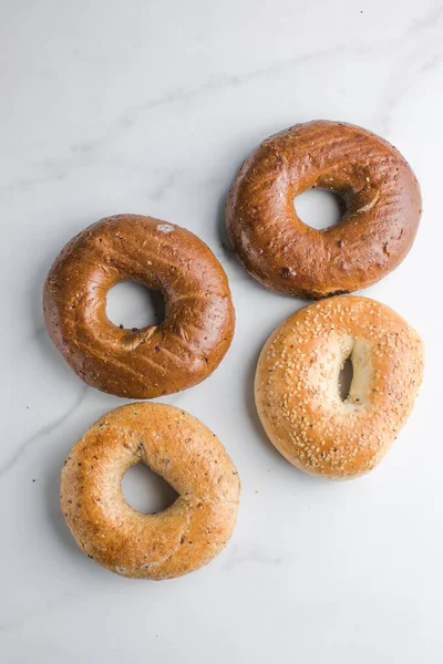 Whole Grain Bagels Sesame Marble Table — Stock Photo, Image