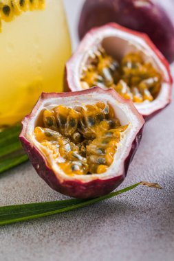 Pure passion, alcoholic cocktail with syrup, lime, orange juice, soda, ice and passion fruit