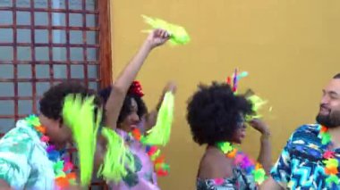 Young people having fun at the carnival in the street