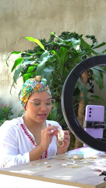 Latin Woman Filming Herself While Working Her Craft Workshop — Stok video