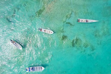 Boats at the beautiful caribbean beach of Capurgana