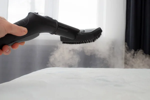 Clean a Mattress with a Steam Cleaner.
