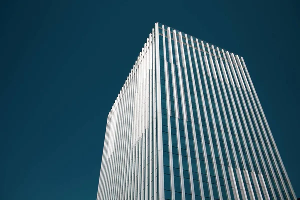 Building Exterior Modern Multistory Glass Facade Blue Dramatic Sky Residential — Stok fotoğraf