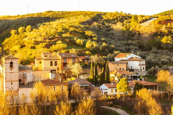 stock image Puebla de valles, Guadalajara, Spain. 7 March 2023 Old Mediterranean-style residential buildings panorama. Houses with orange tile roofs aerial view. Ancient architecture. European village Travel trip