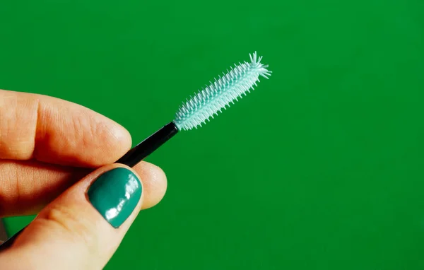 Green Silicone Mascara Brush Woman Hand Green Manicure Green Background — Stock Photo, Image