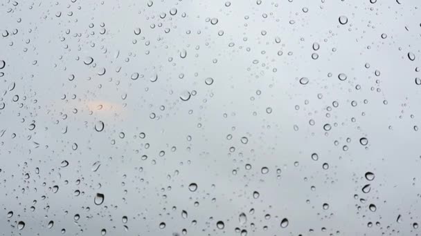 Window Small Raindrops Surface Glass Blue Cloudy Sky Storm Weather — Stockvideo