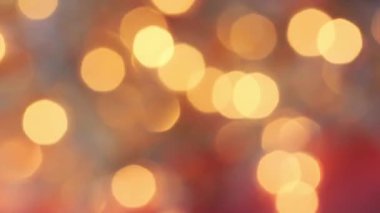 Noel arkaplanı için soyut bulanık bokeh halkaları. Soyut, soyut, şenlikli, ışıltılı sarı ışıklar. Yeni yıl dekoru, pırıl pırıl LED çelenk
