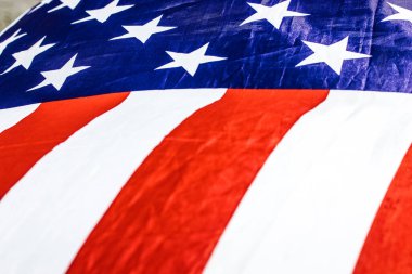 New York, USA 1 May 2025 The American flag waving in the wind, a patriotic symbol of the United States of America. Close-up shot of the American flag with its stars, stripes, that represents freedom.