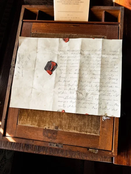 Historical Blurred Handwritten Document Seal Sharp Books Background — Stock Photo, Image