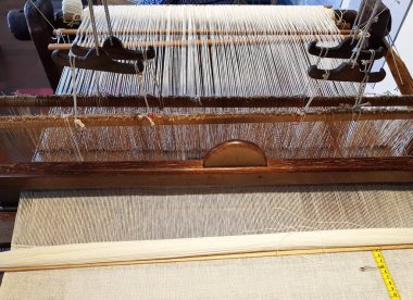 Tarihçi Webstuhl. Kontzept Tekstil Weben