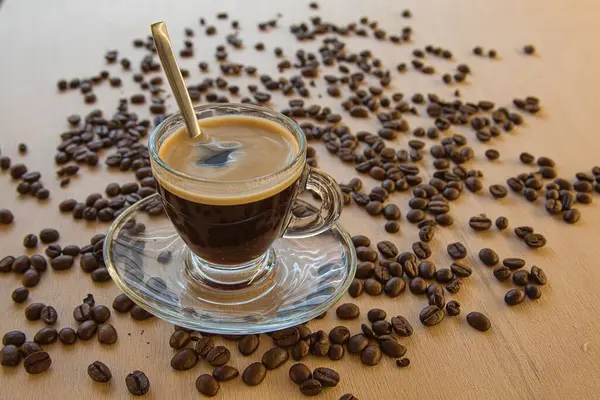Tasse Heißen Kaffee Mit Kaffeebohnen Hintergrund Stockfoto