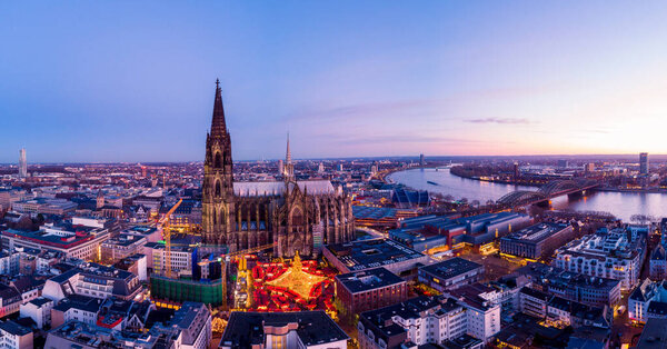 Cologne Germany Christmas market, aerial drone view over Cologne rhine river Germany Cathedral during Christmas