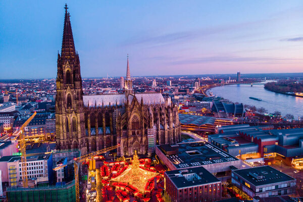 Cologne Germany Christmas market, aerial drone view over Cologne rhine river Germany Cathedral during Christmas in December