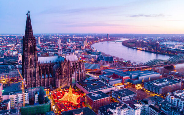 Cologne Germany Christmas market, aerial drone view over Cologne rhine river Germany Cathedral during Christmas