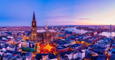 Cologne Germany Christmas market, aerial drone view over Cologne rhine river Germany Cathedral during Christmas clipart