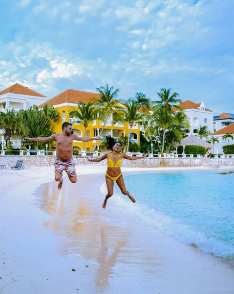 stock image Curacao, Netherlands Antilles happy couple of Asian women and Caucasian men visit Curacao, View of colorful buildings of downtown Willemstad Curacao Caribbean Island