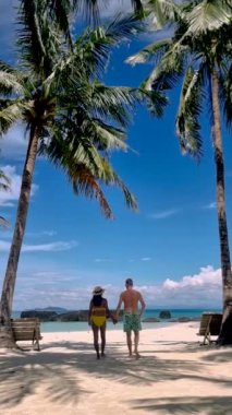 Couple on a trip to the Tropical Island Koh Kham in the Koh Chang archipelago of Trat Thailand. 