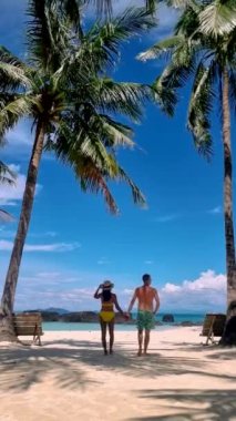 Couple on a trip to the Tropical Island Koh Kham in the Koh Chang archipelago of Trat Thailand. 