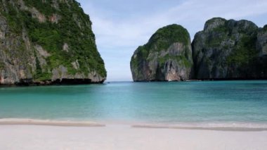 limestone cliffs and tropical beach at the lagoon of Maya Bay Koh Phi Phi Thailand. Tropical Island in Thailand