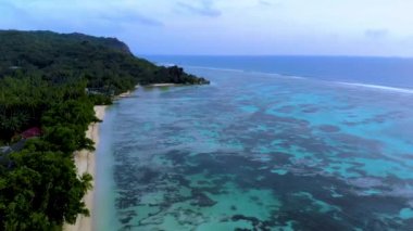 Anse Source D Argent beach La Digue Island Seychelles aerial view on tropical beach Seychelles on a cloudy day