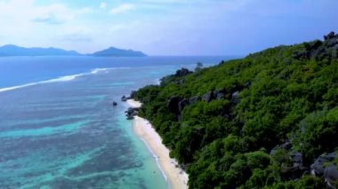 Tropical beach of Anse Source D Argent beach La Digue Island Seychelles aerial view on tropical beach Seychelles.