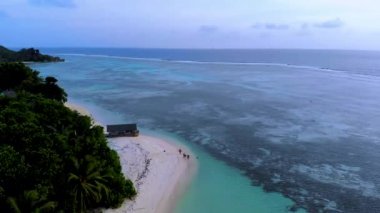 Anse Source D Argent beach La Digue Island Seychelles aerial view on tropical beach Seychelles on a cloudy day