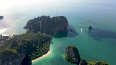 Aerial drone view of the limestone cliffs and tropical beach of Railay Beach Krabi Thailand. 