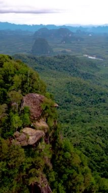 Dragon Crest mountain Krabi Thailand, a rock that overhangs the abyss, with a beautiful landscape. Dragon Crest or Khuan Sai at Khao Ngon Nak Nature Trail in Krabi, Thailand.