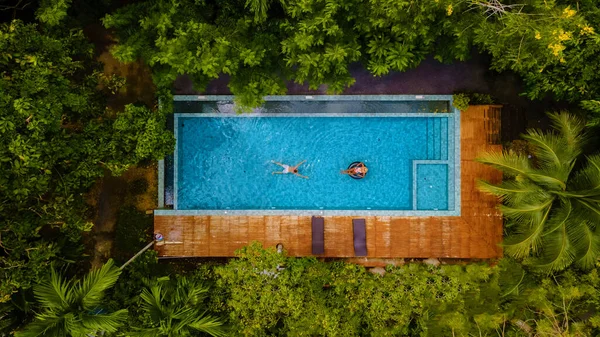Couple Men Woman Swimming Pool Jungle Rainforest Drone View Swimming — Stockfoto