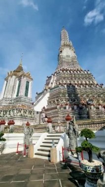Wat Arun temple in Bangkok Thailand on a sunny day. 