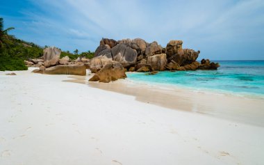Anse Cocos beach with huge granite boulders at La Digue Seychelles Islands. 