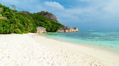 Anse Source dArgent beach La Digue Seychelles Islands, white tropical beach with granite boulders. 