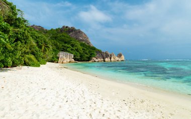 Anse Source dArgent beach La Digue Seychelles Islands, white tropical beach with granite boulders. 