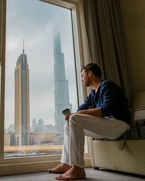 Depressed Men Sitting Room Office Building Looking Out Dubai United — Fotografia de Stock
