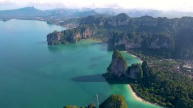 Aerial drone view of the limestone cliffs and tropical beach of Railay Beach Krabi Thailand. 