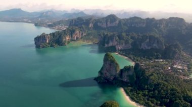 Aerial drone view of the limestone cliffs and tropical beach of Railay Beach Krabi Thailand. 