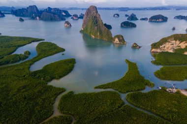 panoramic view of Sametnangshe, view of mountains in Phangnga bay with mangrove forest in the Andaman sea with evening twilight sky, travel destination in Phangnga, Thailand
