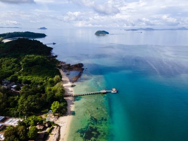 Aerial view from a drone at a tropical beach in Phuket Thailand.