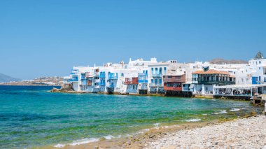 Mykonos Greek village in Greece, colorful streets of Mikonos village on a sunny day.