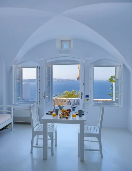 Santorini Greece, breakfast in a traditional dome house during a vacation in Santorini Greece